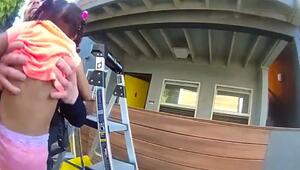 Dramatische Rettung: Polizisten fangen kleines Mädchen und Hund bei Wohnungsbrand auf