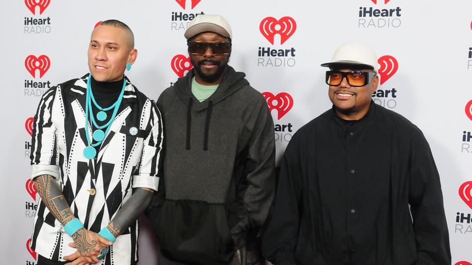 The Black Eyed Peas, Taboo (l.), Will.i.am und Apl.de.ap, bei einem Event in Florida.