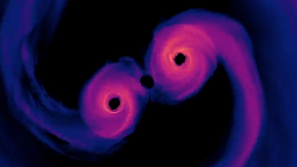 Ausserirdisches Spektakel: In drei Jahren könnten zwei supermassereiche Schwarze Löcher kollidieren.