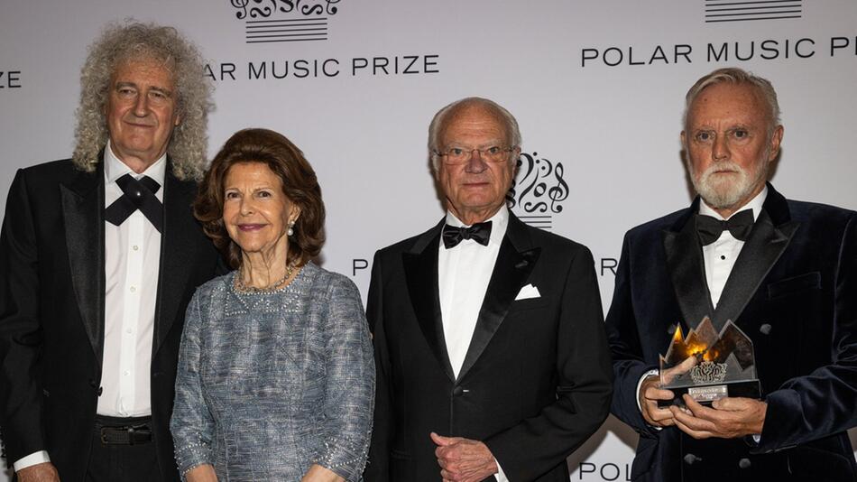 Brian May (v.l.), das schwedische Königspaar und Roger Taylor während der Veranstaltung am 27 ...