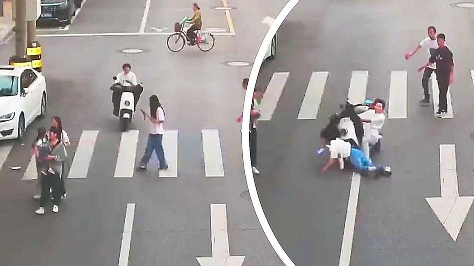 Beide glotzen aufs Handy: Rollerfahrer nimmt Fussgängerin mit