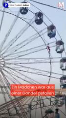 Aus Gondel gefallen: Mädchen klammert sich an Riesenrad fest