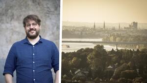 Wolfgang Heisel, Klimaviertel-Koordinator Bonn-Beuel (links), Stadtansicht mit einer Brücke über ...