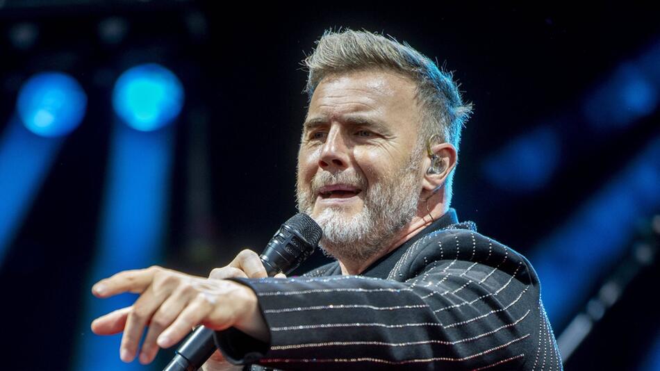 Seit 2005 steht Gary Barlow wieder mit Take That auf der Bühne. Die Band hat inzwischen nur noch ...