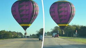 Haarscharf über den Autos: Heissluftballon schwebt über Highway