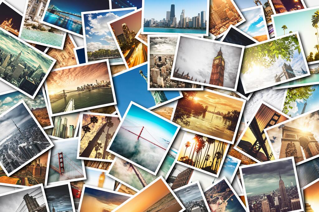 Postkarten mit Bildern von Städten.