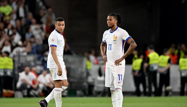 Kylian Mbappé (l) und Michael Olise