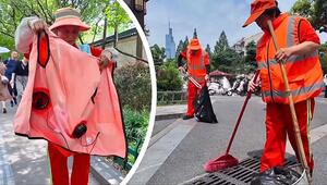 Kühlung to go: Strassenreiniger in Nanjing trotzen der Hitze mit Ventilator-Westen