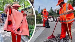 Kühlung to go: Strassenreiniger in Nanjing trotzen der Hitze mit Ventilator-Westen