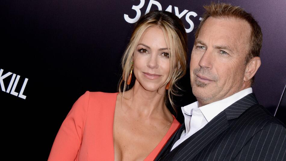 Kevin Costner und Christine Baumgartner