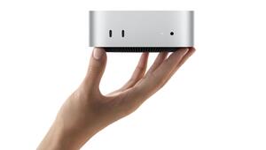 Der neue Apple Mac mini in einer Hand