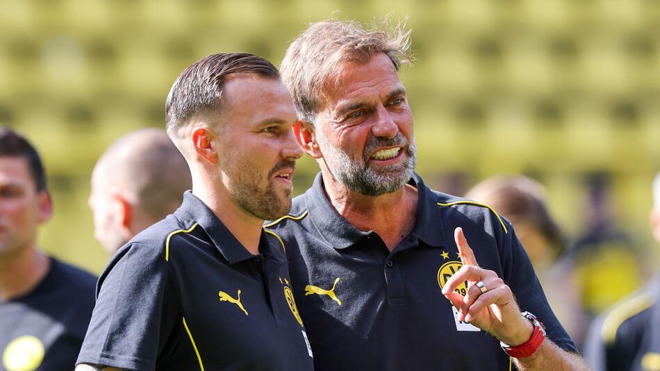 Kevin Grosskreutz (l.) und Jürgen Klopp