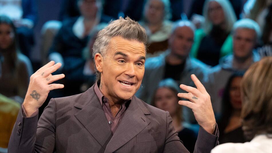 Robbie Williams hat enthüllt, dass er mit Tourette lebt.