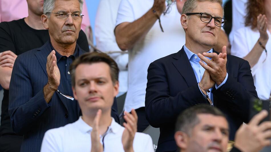 Herbert Hainer (l) und Jan-Christian Dreesen