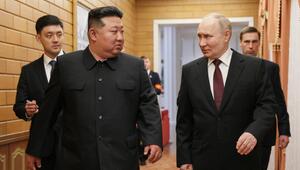 Vladimir Putin, Kim Jong-un 