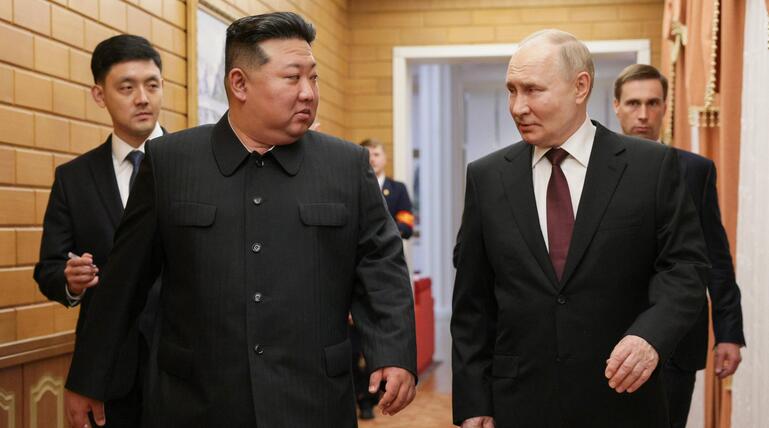 Vladimir Putin, Kim Jong-un 